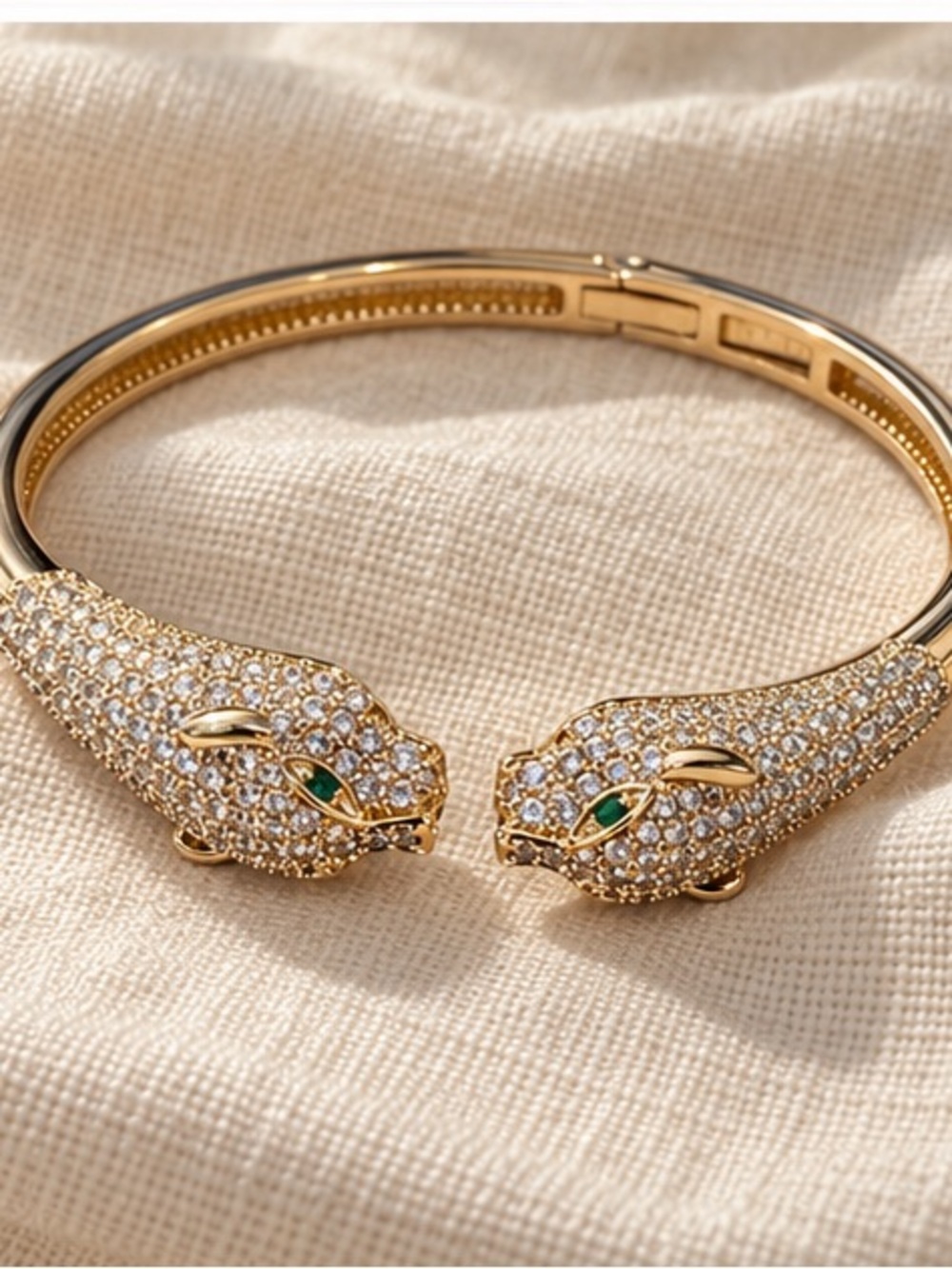 Designer Inspired Gold Tone Pavé Panther Head Bangle Bracelet with Green Eyes